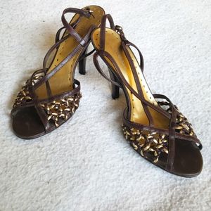 BCBGirls Black and Gold Knit Strap Heels